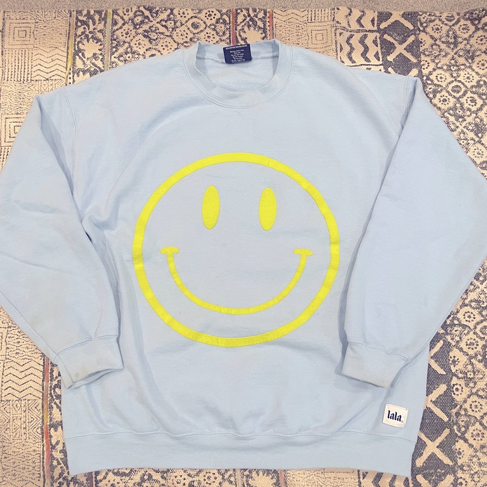 The World Needs Your Magic Puff Print Pullover in Sky Blue